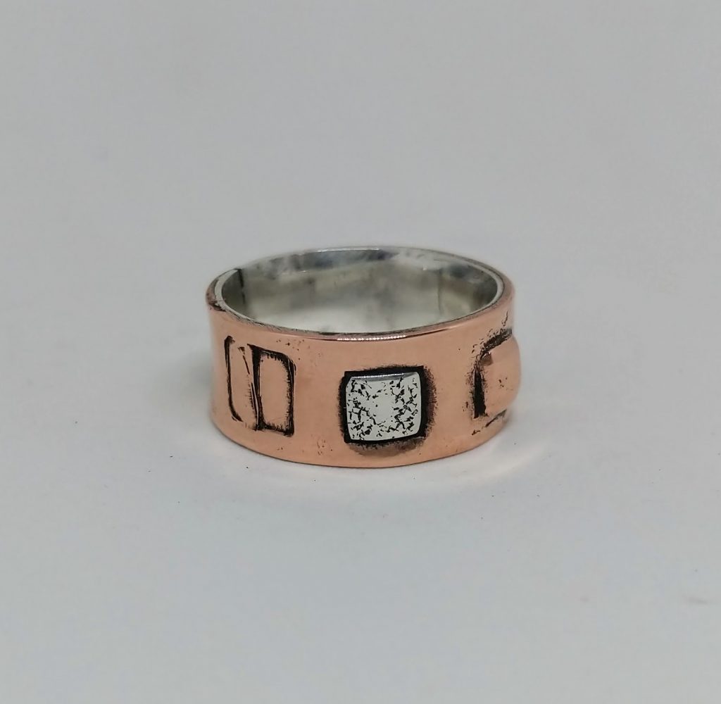 Silver lined copper ring