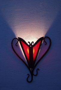 Iron wall light with stained glass