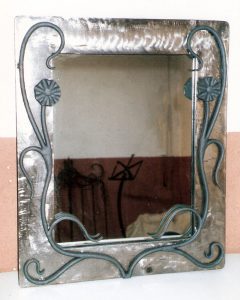 mirror with iron flowers