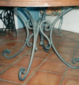 wrought iron and wood table