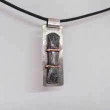 Silver, iron and copper pendant