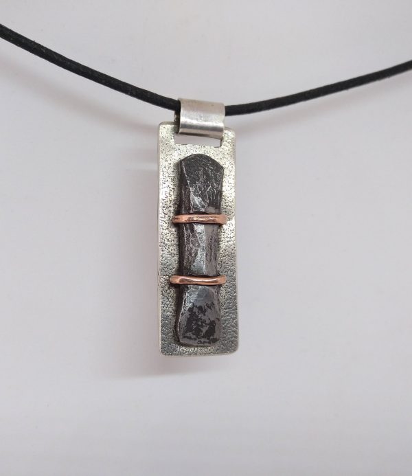 Silver, iron and copper pendant