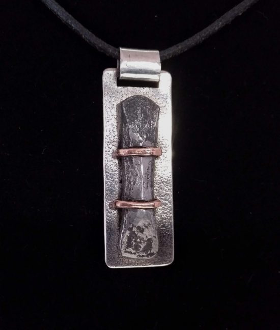 Silver, iron and copper pendant