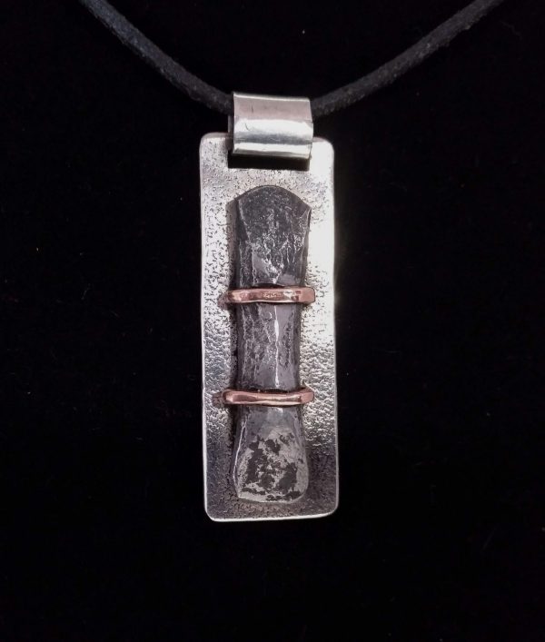 Silver, iron and copper pendant