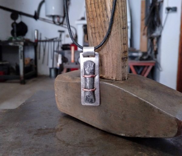 Silver, iron and copper pendant