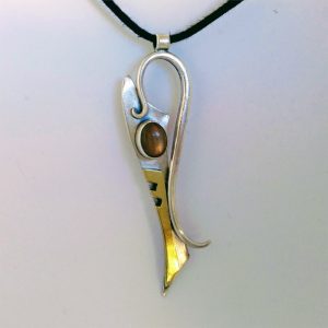Silver pendant with labradorite and brass