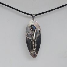 Pendant with silver curves and labradorite Pendant with silver curves and labradorite