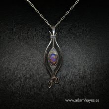 Forged and textured silver pendant set with Purple Turquoise