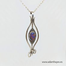 Forged and textured silver pendant set with Purple Turquoise