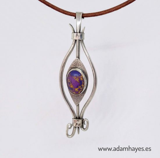 Forged and textured silver pendant set with Purple Turquoise