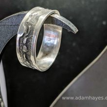 Silver ring with textured overlap 4 Silver ring with textured overlap