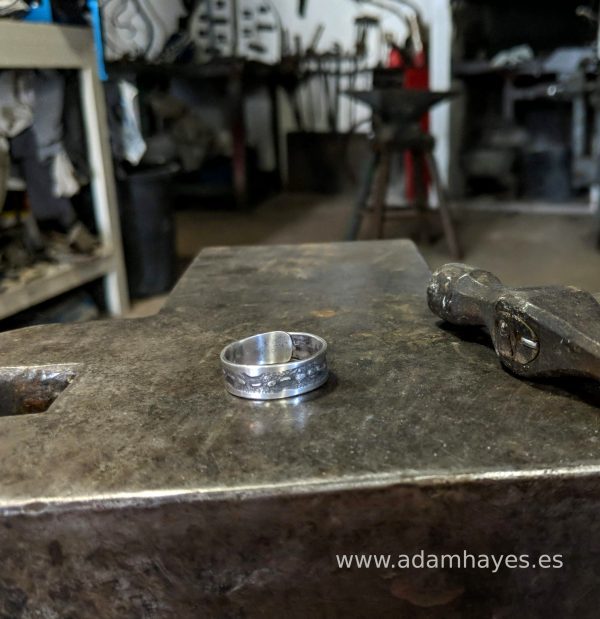 Silver ring with textured overlap 5 Silver ring with textured overlap