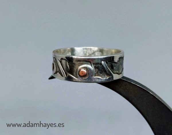 Silver ring made with twisted die