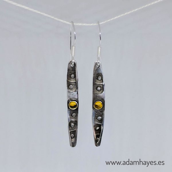 silver earrings with yellow resin decoration